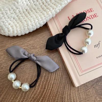 China Fashion Korean Trend Summer Pearls Bow Elastic Hair Ties Simple Elegant Women Hair Accessories Ponytail Rubber Bands for sale