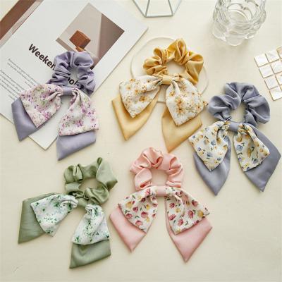 China Friendly Material Korean New Design Fashion Fabric Hair Ties Fashion Floral Print Double-deck Bowknot Elastic Scrunchies For Girls for sale