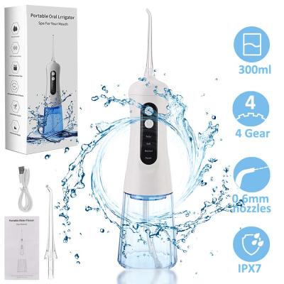 China IPX7 Waterproof Electric Dental Oral Jet Flosser Tooth Cleaning Tools Kit Rechargeable Dental Water Tank 300ML Irrigator for sale