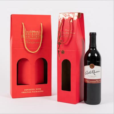 China Fashionable and high quality handmade wine packaging bags, portable paper bag for wine with carrier, wine gift bag for party wedding gifts for sale