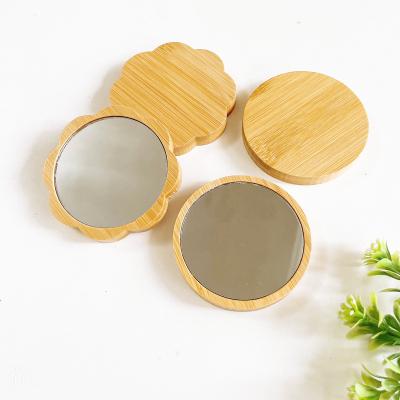 China Contemporary Hot Selling Cosmetic Round Pocket Mini Mirrors Small Mirror Hand Held Bamboo Makeup Custom Made Amazon Wholesale for sale