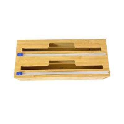 China Amazon Sustainable Hot Sale Bamboo Cling Type Rotary Plastic Sheet Cutting Box Kitchen Divider Cutter Tin Foil Cutter Sucker Box for sale