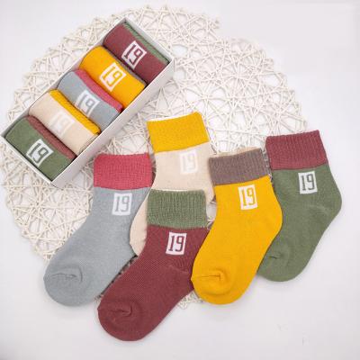 China QUICK DRY Children's Cotton Socks Tube Boys Girls Kids Baby Big Socks Five Packs Socks for sale