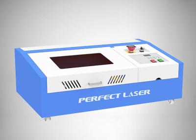 China 40w 50w Mini CO2 Laser Rubber Stamp Engrave Engraving  Engraver Machine for sale