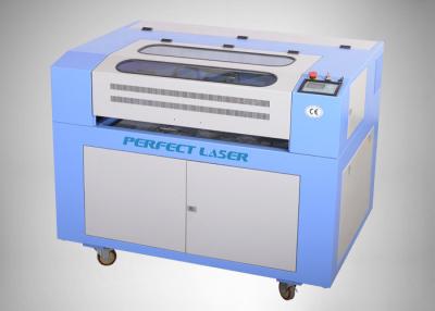 China Desktop Home Used Small CO2 Laser Engraving Machine For Stamp Wood Acrylic Rubber for sale