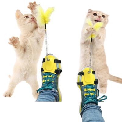 China Hot Selling Viable Cat Toy Spring Funny Stick Creative Fighting Bounce Feather for sale