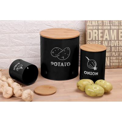 China Hot Selling Freshness Keeping Household Potato Bin Storage Box Vegetable Kitchen 3 Pack Set Metal Onion Garlic Potato Canister Set for sale