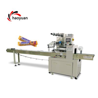 China Automatic Horizontal Food PLC Control Date Ball Protein Bar Packing Machine Pillow Biscuit Cake Flow Wrapping Machine for sale