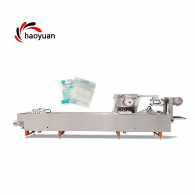 China HY420 Haoyuan Thermoforming Products Automatic Packing Machine for Cotton Swab Medical Four Plastic Packaging Side Sealing 30-400bags/min for sale