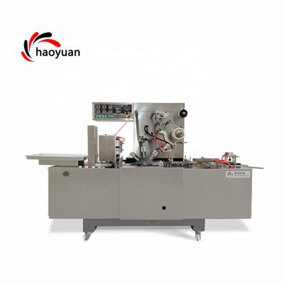 China HY-210 High Quality Food Perfume Box Cellophane Wrapping Packing Machine From Zhejiang Plastic Packaging Material Manufacturer for sale