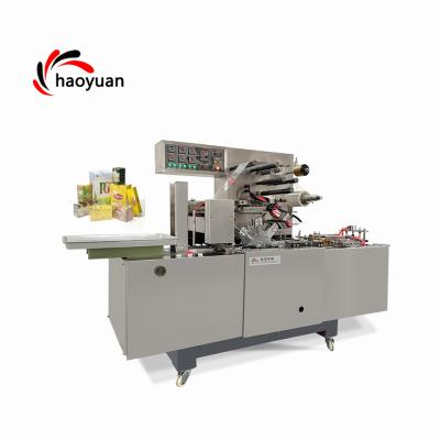 China HY-350 30-50bags/min Automatic Food Candy Cellophane 3D Wrapping Bar Soap Wrapping Machine for sale