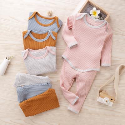 China Children's Pajamas Wholesale Baby Soft Breathable Plain Candy Baby Clothes Romper Set Newborn Baby for sale