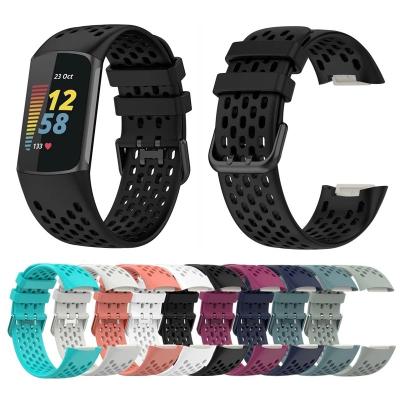 China Replacement Watch Band Solid Color Soft Sport Wristband Strap For Fitbit Charge 5 Honeycomb Style Holes Silicone Breathable Watch Band for sale