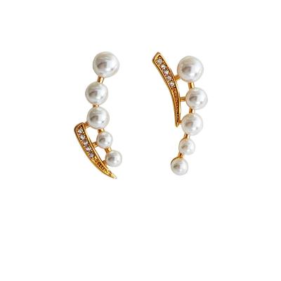 China 2022 TRENDY Trendy Gold Plated Asymmetrical Earrings Elegant Pearl Stud Earrings Women Jewelry for sale