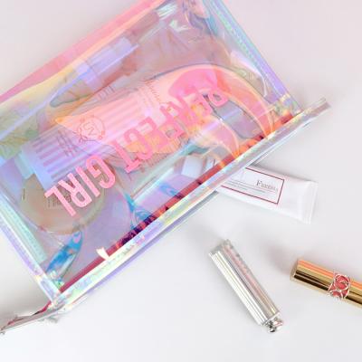 China Large Capacity Custom Size Zipper Fashion Travel Transparent PVC Clear Shine Women Cosmetic Pouches Holographic Plastic Makeup Bag for sale