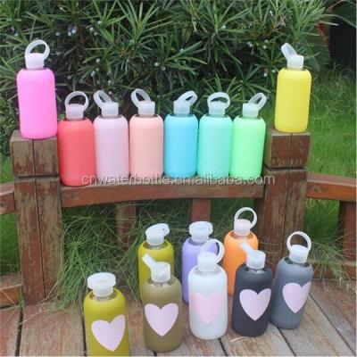 China Sustainable Glass Water Bottle 500ml Add Silicone Sleeve for sale