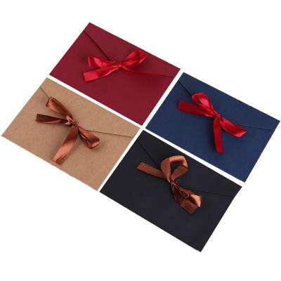 China Gift Envelope Business Invitation Card Packaging Luxury Logo Printing Logo Kraft Paper Customized Envelope With Ribbon Bow for sale