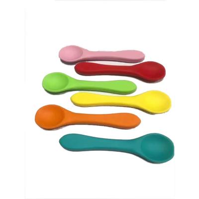 China Eco Friendly Toddler BPA Free Complementary Free Silicone Baby Food Training Feeding Spoon for sale