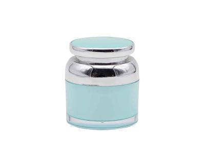 China Light Blue And Shiny Silver Color Cylinder Plastic Jar 50g Skin Care Round for sale