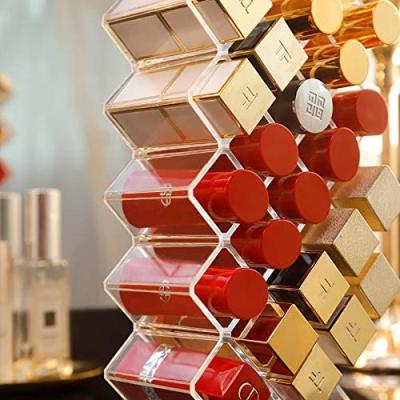 China Viable Clear Acrylic Fish Shapes Lipstick Organizer Tower Lip Gloss Storage Rack Holder For 28 Lip Sticks for sale