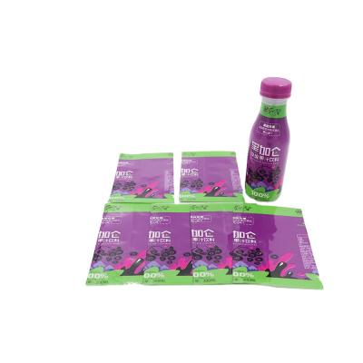 China Jungle Bottle Label Waterproof Juice Black Waterproof Label Shrink Packing Label for sale