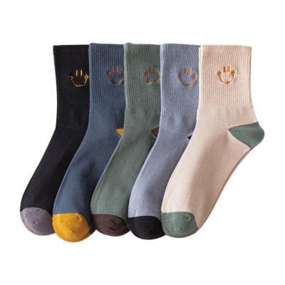 China Autumn Winter Crew Cotton Socks QUICK DRY men design embroidered Smiley Face Tube Socks Custom Logo Man for sale