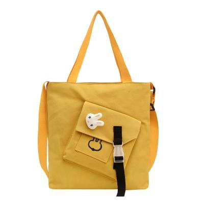 China Fashion Brand New Factory Price Preppy Style Unique Design Cross - Body Handbag Women Single Shoulder Canvas Bag for sale