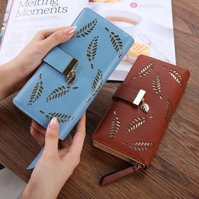 China Ladies Style PU Leather Hand Purse Beautiful Korean Leaf Waterproof Hollow Wallets For Women for sale