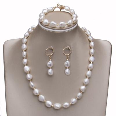 China Wholesale High Quality White Freshwater Pearl Chain Geometry Pendant Ear Cut Ot Loop Bracelet Pearl Earing and Necklace Women Jewelry Set for sale