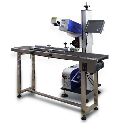 China Laser CO2 20W 30W 60W Flying Laser Marking Machine For Water Bottle Wood On Production Line for sale