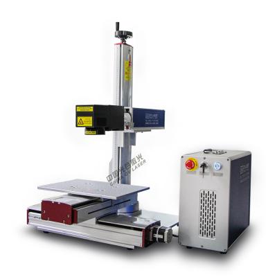 China Laser Marking 3D Curve Relief 3D Fiber Laser Engraving Machine Outdoor Dynamic Focusing 3d Laser Marking Machine for sale