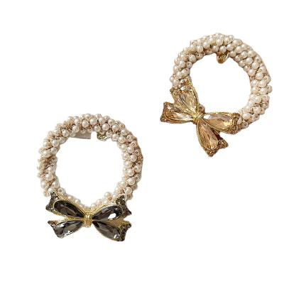 China Fairy Ring Simple Jewelry Hair Accessories Leather Headband Of A Bow Pearl Elastic Band Popular Hair Accessories for sale