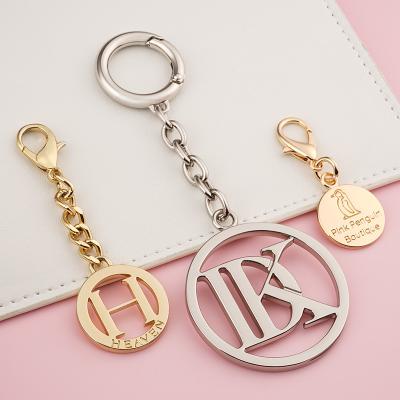 China Hanging Metal Bag Tag Metal Hang Tag With Chain And Hook For Handbag for sale