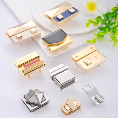 China Press Handbag Lock Hardware for Bags Custom Design Metal Push and Turn Closures for sale