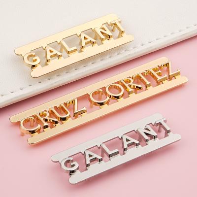 中国 Customized Handbag Hardware Gold Metal Logo with Separate Letters and Hardware 販売のため