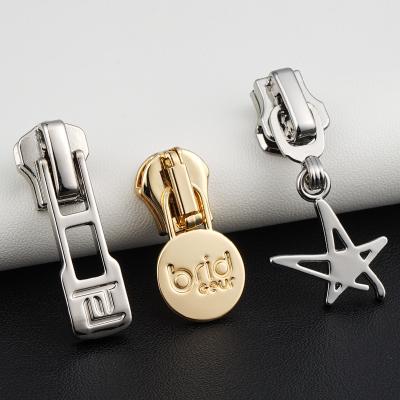 China Customised Garment Accessories Auto Lock Slider Type with 5 Metal Round Zipper Slider for sale