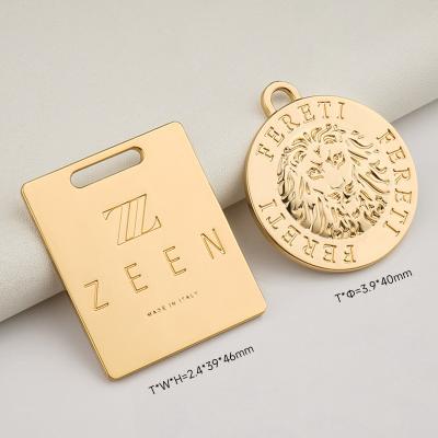 China Gold Metal Hangtag For Custom Handbags Custom Designs And Customer Size Options for sale