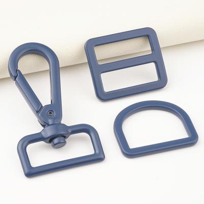 China Metal Bag Buckle 1 Inch Adjustable Buckle D Ring 25mm Navy Blue for Bag Hardware Mould zu verkaufen