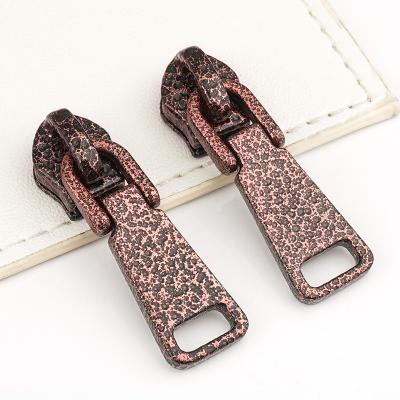 China Handbag Hardware Accessories Popular Zinc Alloy Metal Zipper Pulls No.5 in Antique Copper for sale