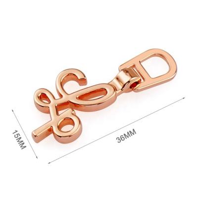 China Rose Gold Metal Letters Zipper Puller Zipper Sliders for Clothes Garment Accessories for sale