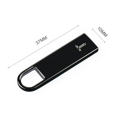 China Zinc Alloy Gunmetal Plated Metal Zip Pull for Clothing Custom Logo Zipper Pull for sale