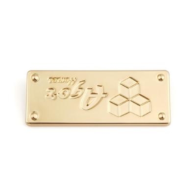 China Handbag Metal Name Plate with Custom Fashion Metal Plate Logo Rectangle Metal Logo en venta