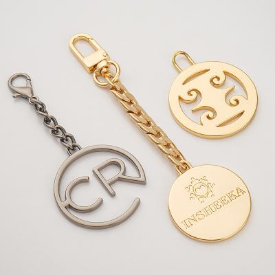 China ISO Certified Fashion Design Logo Metal Keychain Bag Accessories with Customized Design for sale