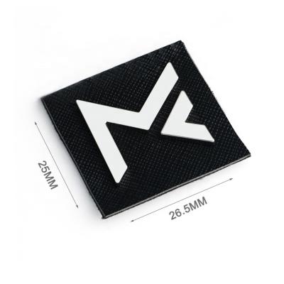 China Leather Letter Custom Metal Label For Garment Jeans Shoes And Bags One Side Fold for sale