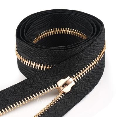 Κίνα 5 Gold Teeth Metal Zipper Tape By The Yard for Clothing and Bag Embellishments προς πώληση