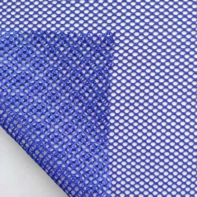 China New Design Flame Retardant Polyester Sports Mesh Fabric Hard Polyester Mesh Fabric Hexagonal Knitted Fabric for sale