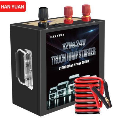 China Passenger Car 210000mah Large Capacity Truck Start Device Battery Jumper With Cables Use For 12V 24V Vehicles Car Emergency Tool Jump Starter for sale