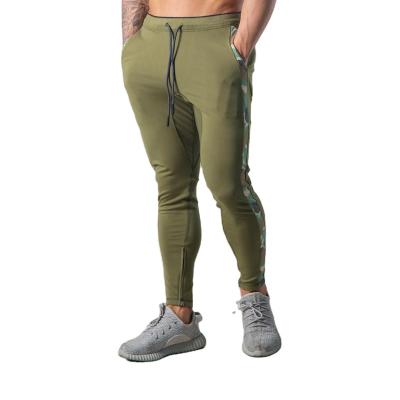 China Customized Logo Printing Mens Sportswear Cargo Tracker Pants Breathable Sublimation Side Splicing Stripe Tapered Slim Mens Sweatpants for sale