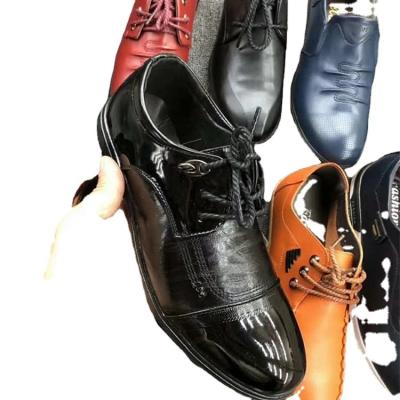 China Best Used Clothing AA Quality Fashionable Mix Used Shoes 25 Kg 50 Pairs One Ball Men Used Leather Kid Shoes For Wholesale for sale