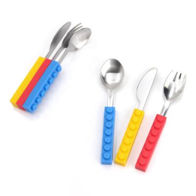 China Viable Kids Cutlery Set Baby Flatware Stainless Steel Spoon Handle Design Utensils and Fork Set Silicone Utensils Bau Messer und Gabellffel for sale